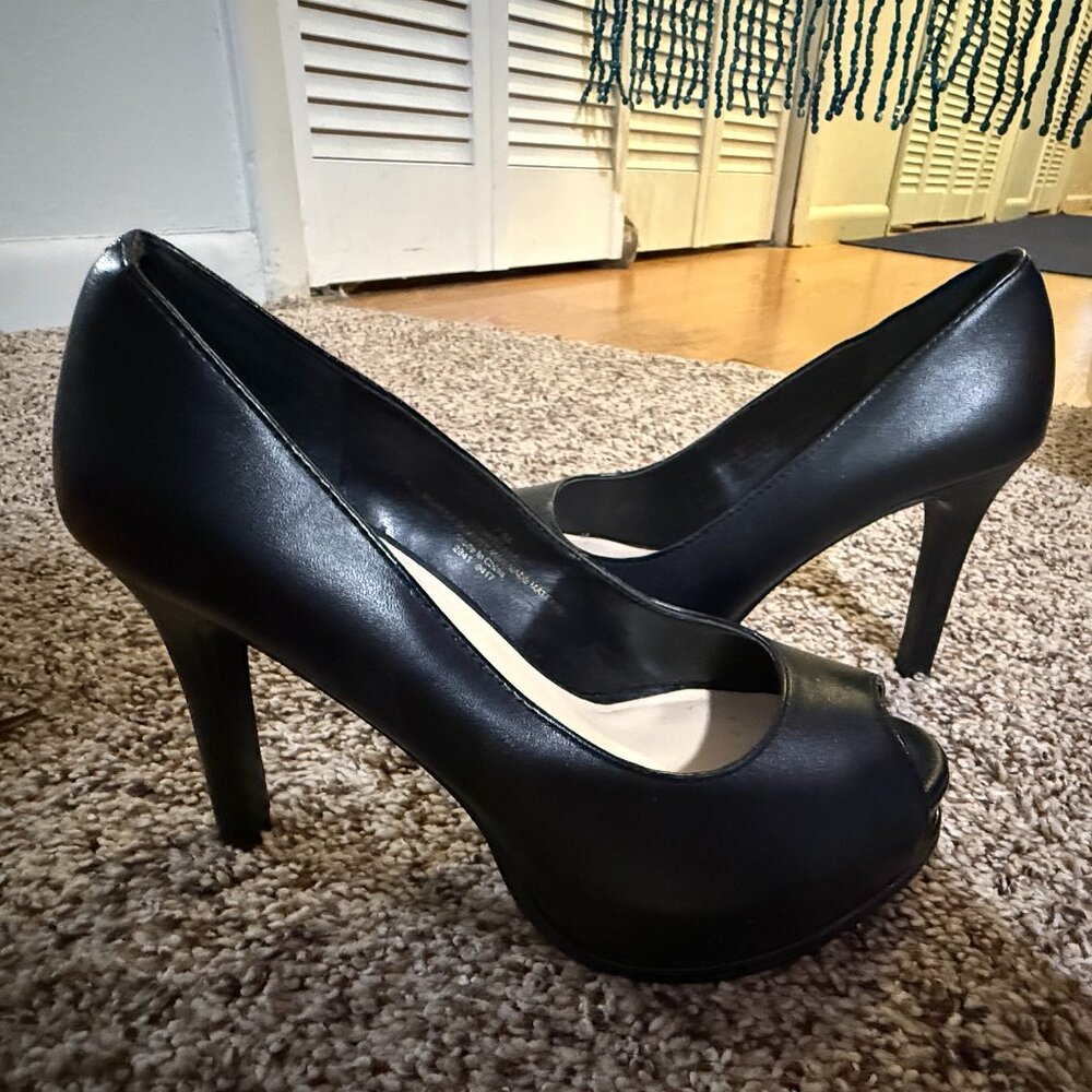 High-heeled peep-toe pumps with a platform sole